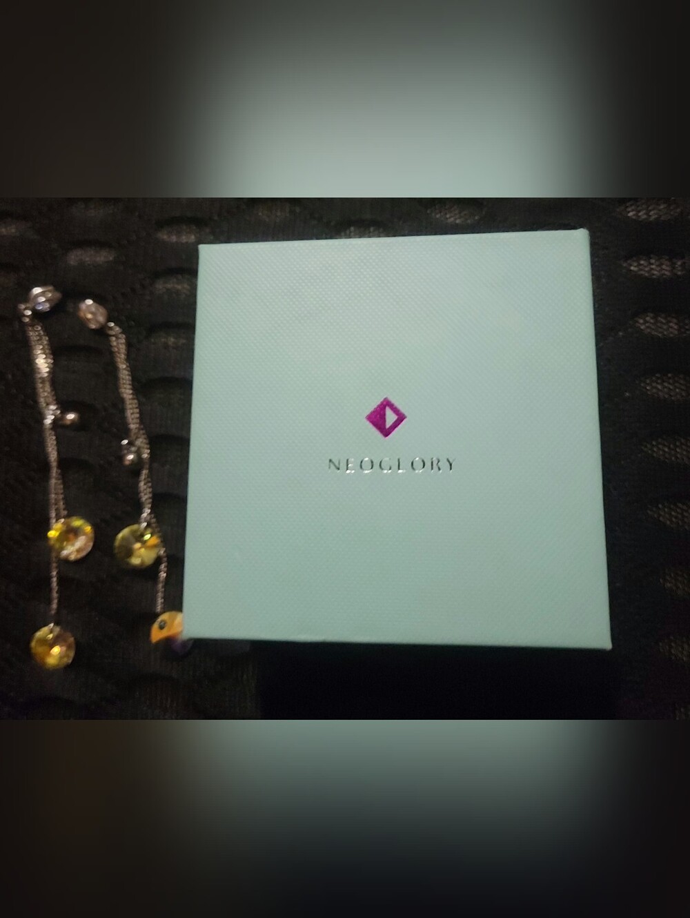 Neoglorypair of silver-toned drop earrings